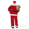 يقف شخصية سانتا كلوز مع حقيبة الهدال